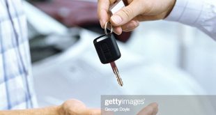 Car Rental software In Lyon Ky Dans Closeup A Person Giving Car Keys to A Man Highres Stock
